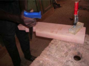 Shaping the handle of an Olympic target archery-style bow using hand tools