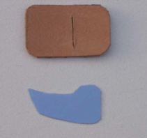 Making a target archery arrow rest out of plastic from a bottle and leather